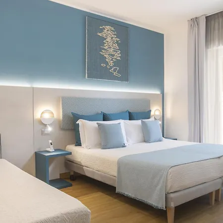 Отель Lu' Porto Pino